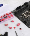 Red Dip Switch Kit For Breadboards with 2.54mm PCB Mount shown next to motherboard and tools, ideal for electronics projects.