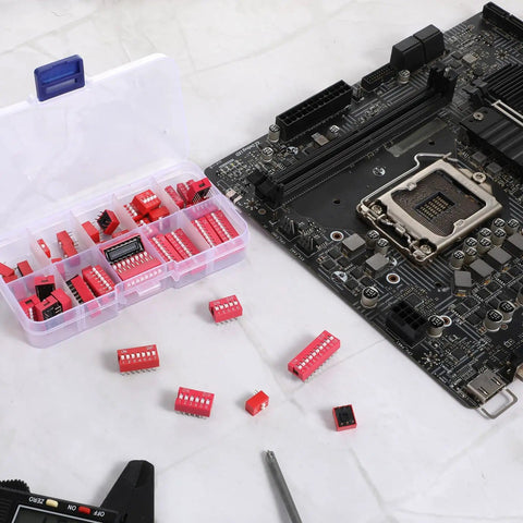 Red Dip Switch Kit For Breadboards with 2.54mm PCB Mount shown next to motherboard and tools, ideal for electronics projects.