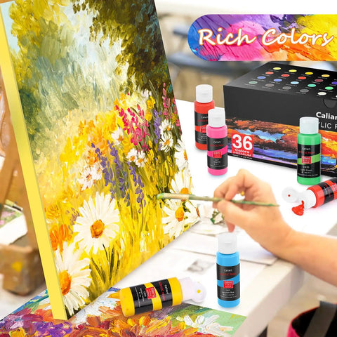 Artist painting with Acrylic Paint Set With 36 Dope Rich Pigment Colors, 2 Oz Bottles, Includes 12 Brushes, on canvas