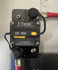 Three Eighths Inch 300 Amp Auto Circuit Breaker With Manual Reset installed showing front view and connection wires.