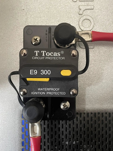 Three Eighths Inch 300 Amp Auto Circuit Breaker With Manual Reset installed showing front view and connection wires.