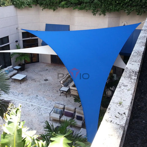 Blue Sun Shade Sail Right Triangle 8x8x11.3 Ft Built Tough UV Blocking Fabric covering outdoor patio area.