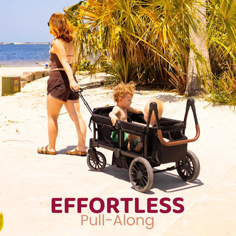 All-Terrain Wagon Stroller For Two Kids Kid-Friendly Foldable Outdoor Beach Wagon With Removable Canopy in use on beach