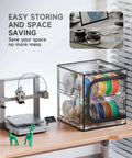 Maker Friendly Two Tier 3D Printer Filament Storage Rack With Transparent Cover holding spools on desk near 3D printer