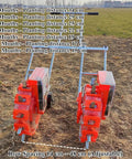 Double Row Seed Spreader Manual Garden Seeder With Portable Hand Push Roller Seeding And Fertilizer Applicator Row Planter Farm Seeder With 16 Seed Plates And Five Openings shown on field with adjustable row spacing