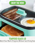 3 In 1 Breakfast Station With Ceramic Nonstick Dual Griddles For Eggs Sausage Bacon Pancakes And Breakfast Sandwiches, 2 Slice Toast Drawer And Easy Timer Turquoise Kitchen Appliance with tempered glass lid showing eggs and toast