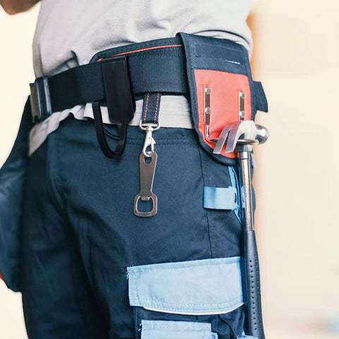 Close-up of Heavy Duty Tool Belt Clips Six Pack For Securely Holding Your Hammer Drill Power Tools And Electrical Rig Upgrades, attached to canvas belt.