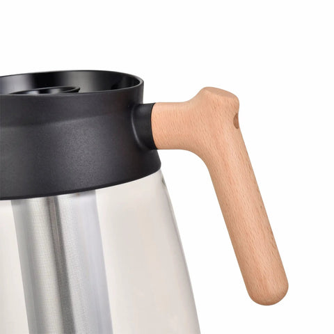 Close-up of 12 Cup Glass Carafe Replacement for CFP301 CM300 CM401 Coffee Makers showing beech wood handle and filter.