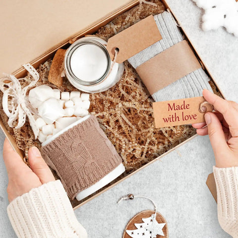 Gift box with 2.2 Lb Brown Crinkle Shredded Paper For Gift Baskets And Gift Boxes, cozy candle, socks, and 'Made with love' tag