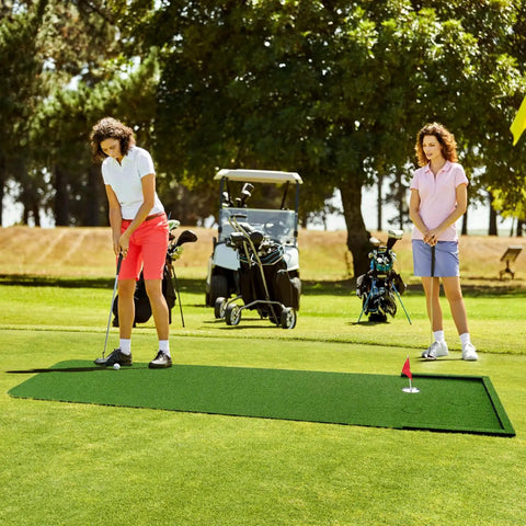 Individuals golfing on Indoor Outdoor 3x10ft Golf Putting Green Mat With Thick 10mm Non Slip Base And Side Borders Portable Three Hole Design Movable Cup For Home Backyard Or Office Practice Realistic Turf outdoors