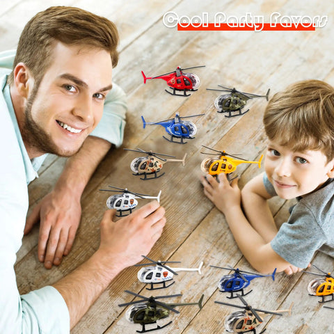 Father and son playing with eight pack diecast helicopters mini model planes with spinning propellers for kids birthday party favors