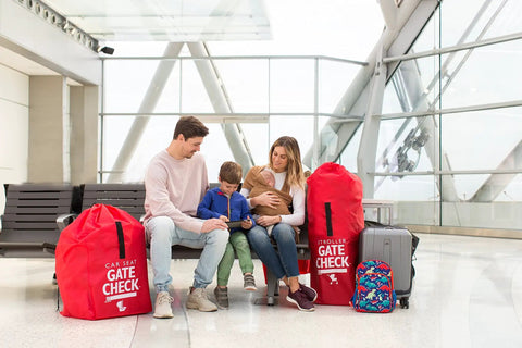 Family sitting in airport with Go To Gate Check Stroller Bag For Umbrella Strollers Travel Bag For Airplane Fits Most Single Umbrella Baby Strollers Airport Essentials For Gate Check Flying Essentials Red