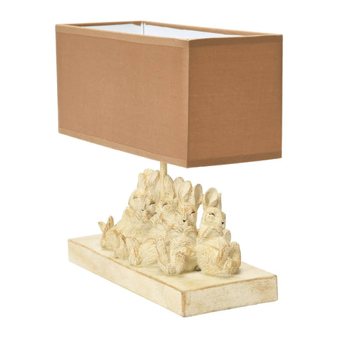 Whitewashed Rabbit Table Lamp With Sand Colored Linen Shade Cute Bunny Night Light For Farmhouse Nursery And Woodland Decor Cozy Bedroom Accent With Six Sleeping Baby Bunnies At The Base, side view