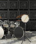 Rock Solid Adjustable 12 Inch Snare Drum Rack Tripod Stand Black Foldable Alloy Practice Rig in front of amplifiers