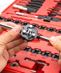 Hands holding die handle in 76 Piece Tap And Die Set For External And Internal Threads Rethreading Cutting And Repair Tool Kit