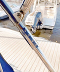 Side view of marine straight pipe fitting connector, stainless steel 316, 25 mm (1 in), 2-pack, installed on railing.