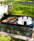 Heavy Duty Stainless Steel Cheese Melt Dome Set Of Two on a flat top grill with burgers and skewers under the sun.