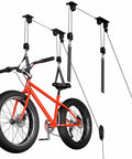 2 Pack Heavy Duty Bike Hoist Pulley System For Garage Ceiling Storage, Easy Lift For Ebikes And Bikes, Ladders, Snowboards, Holds Up To 85 Lbs, Fits 10 To 16 Foot Ceilings, Space Saving Vertical Mount installed lifting a bike