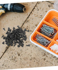 Genuine M4x10mm Carbon Steel Mini Screws With Slick Black Finish scattered on a work surface, ideal for DIY projects.