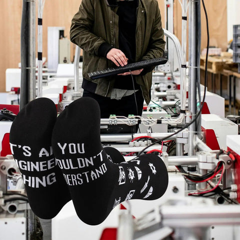 Its An Engineer Thing You Wouldnt Understand Socks Funny Novelty Gift For Civil And Mechanical Engineers displayed on factory floor