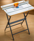 Rock Solid Router Table Kit With Powder Coated Steel Stand And Smooth Phenolic Plate Crafted For Precision Routing and Quick Shop Setup.