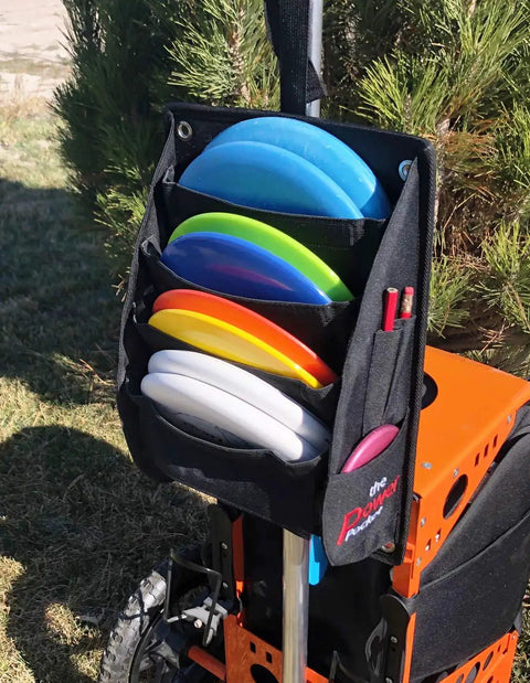 Power Pocket Disc Golf Cart Putter Pouch For Discs And Accessories That Lets You Grab Up To Eight Discs On The Fly Plus Easy Access To Your Rangefinder Phone And Keys While You Roll To The Next Hole attached to cart with discs visible