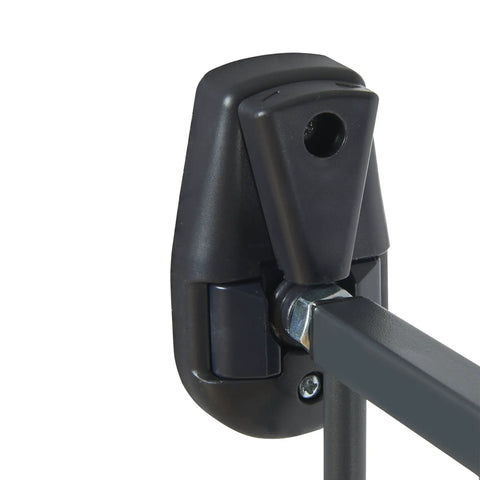 Close-up of lock mechanism on Push To Close Baby Gate For Stairs And Hallways, hardware mounted safety gate with metal construction