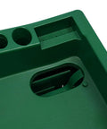 Close-up of green Automatic Golf Tee Machine with cordless ball dispenser compartment and slots for 9 club jacks.