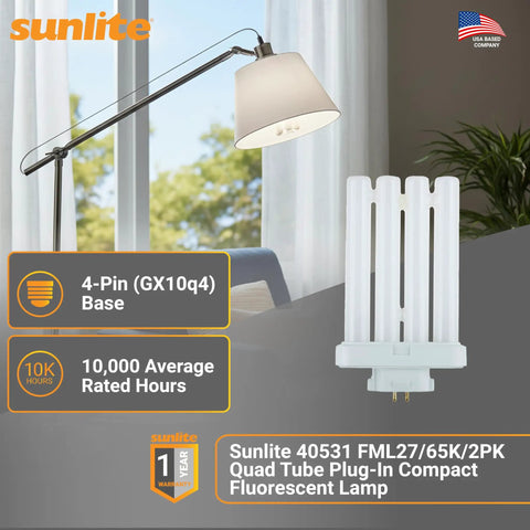 Quad Tube Plug In CFL Lamp 27W 1500 Lumens 6500K Crisp Daylight GX10q4 4 Pin Base on desk with reading lamp background