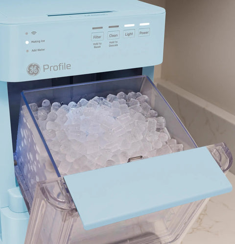 Portable Countertop Nugget Ice Maker Delivers Sick Chill Levels With Legit Chewable Snow Ice Ready Fast showing ice bin filled with ice.