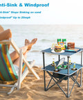 Folding Beach Table For Sand Camping With Insulated Cooler Storage And Four Cup Holders Portable Pop Up Picnic Table Lightweight Outdoor Side Table For Outdoor Use on beach sand with items