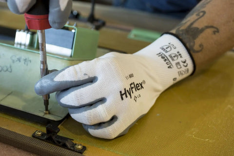 HyFlex 11-800 Nylon Glove With Gray Foam Nitrile Coating, Knit Wrist Cuff, Size 8 Medium, gripping a tool during auto work.
