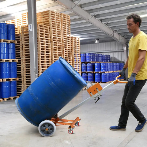 Badass 55 Gallon Drum Dolly Heavy Duty Drum Truck With Reinforced Steel Frame 1000 Lb Capacity maneuvering a blue barrel in a warehouse.