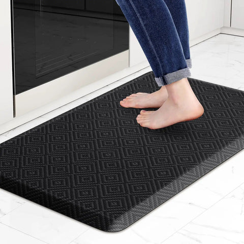 Person standing on a 17.3 by 28 inch Comfy Cushioned Anti Fatigue Kitchen Mat For Standing Long Shifts Water Resistant Non Slip Floor Rug