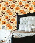 Halloween Botanical Peel And Stick Wallpaper Self Adhesive Removable Wall Decor Large Roll Easy Peasy Diy Room Glow Up With Dope Seasonal Vibes Covers 14 Square Feet, featuring orange pumpkins and bats in a cozy bedroom.