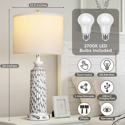 Two Modern 26 Inch Table Lamps With USB A And USB C Ports, 3 Way Dimmable Touch Control, White Linen Shade, Resin Coastal White Gray Nightstand Lights For Living Room And Bedroom, Includes 2700K LED Bulbs next to bed with detailed features illustrated.