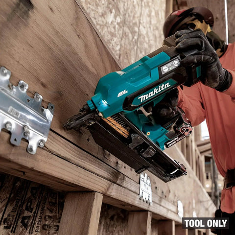 Worker using 18V LXT Cordless Framing Nailer With 21 Degree Full Round Head, 3-1/2 Inch, Tool Only, on timber frame construction