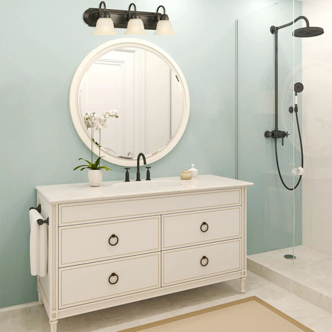 Three Light Dimmable Vanity Light In Oil Rubbed Bronze With Frosted Glass Shades, 24 Inch Wide, Large Backplate, installed in bathroom.