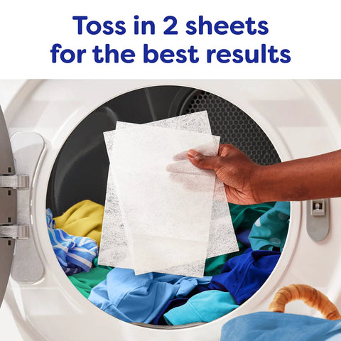 Person placing Unscented Dryer Sheets 240 Count For Sensitive Skin Hypoallergenic Dermatologist Tested into laundry dryer