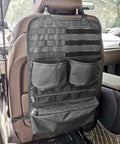 Backseat Organizer With Car Fire Extinguisher Storage And MOLLE Panel Back Seat Cover installed in F150 truck interior.