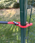 Heavy Duty Fence Stretcher Tool For Chain Link Fabric Upgraded One Person Operation Fence Puller With Nine Inch Pull Range Fits 2 3 Eighths Inch OD Posts 1 Pack Easy Hang Align And Light Tension shown in use on a green chain link post