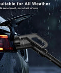 Hella Reliable J1772 To Nacs Charging Adapter Boasting 240V Ac Power Delivery And 80 Amp Heavy Duty Plug Converter for Tesla charging in rain.