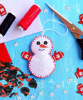 Massive Christmas Craft Button Kit With 450 Pieces Including carrot noses, tiny black buttons, mini plastic top hats, glove buttons.