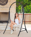 Macrame Hammock Chair With Stand Heavy Duty Swing Chair Cushioned Seat Natural Color For Patio Porch Outdoor Use Supports Up To 400 Lbs Chill And Relax Anywhere In Your Backyard Or Deck with person