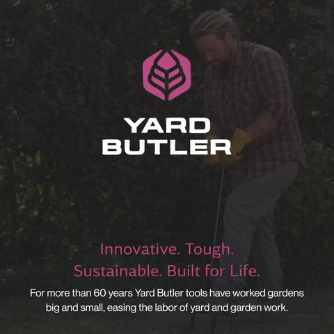 Manual Lawn Coring Aerator With Long Handle, Powder Coated Steel Construction, Cushioned Handles in use near garden