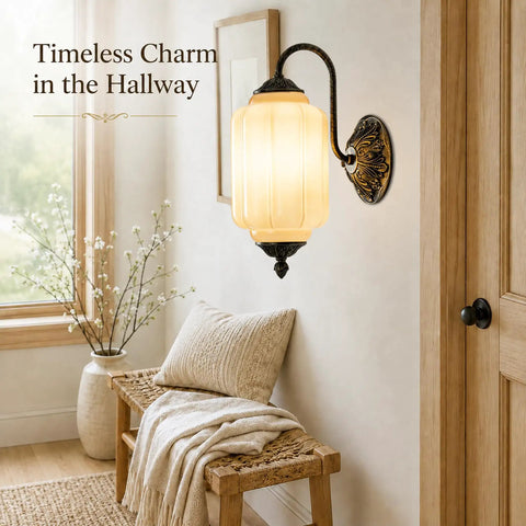 RONGHUAFUGUI Vintage Modern Wall Sconce with Amber Glass illuminates a cozy hallway with warm light and elegant design.