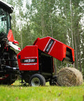 Hay Baler And Wrapper Combo HB3120 HW20 For Farms And Small Operations with red baler and wrapped bale in field.
