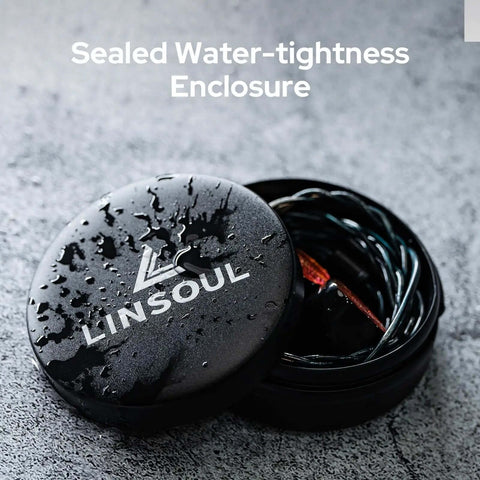 Compact Aluminum Earphone Case Built Different For Road Trips And Daily Drivers Featuring A Water Resistant Shell with earbuds inside.