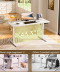 55 Inch Electric Standing Desk With Sit To Stand Height Adjustment And Memory Presets in home office
