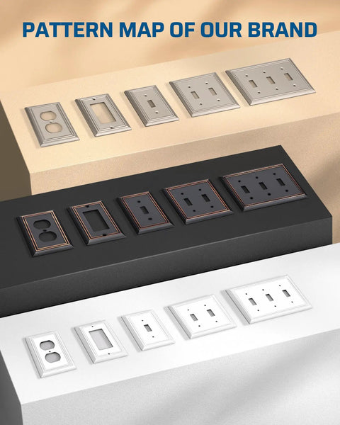 Four Pack White Metal Outlet Covers With Retro Texture, displayed on a surface with other decorative electrical faceplates